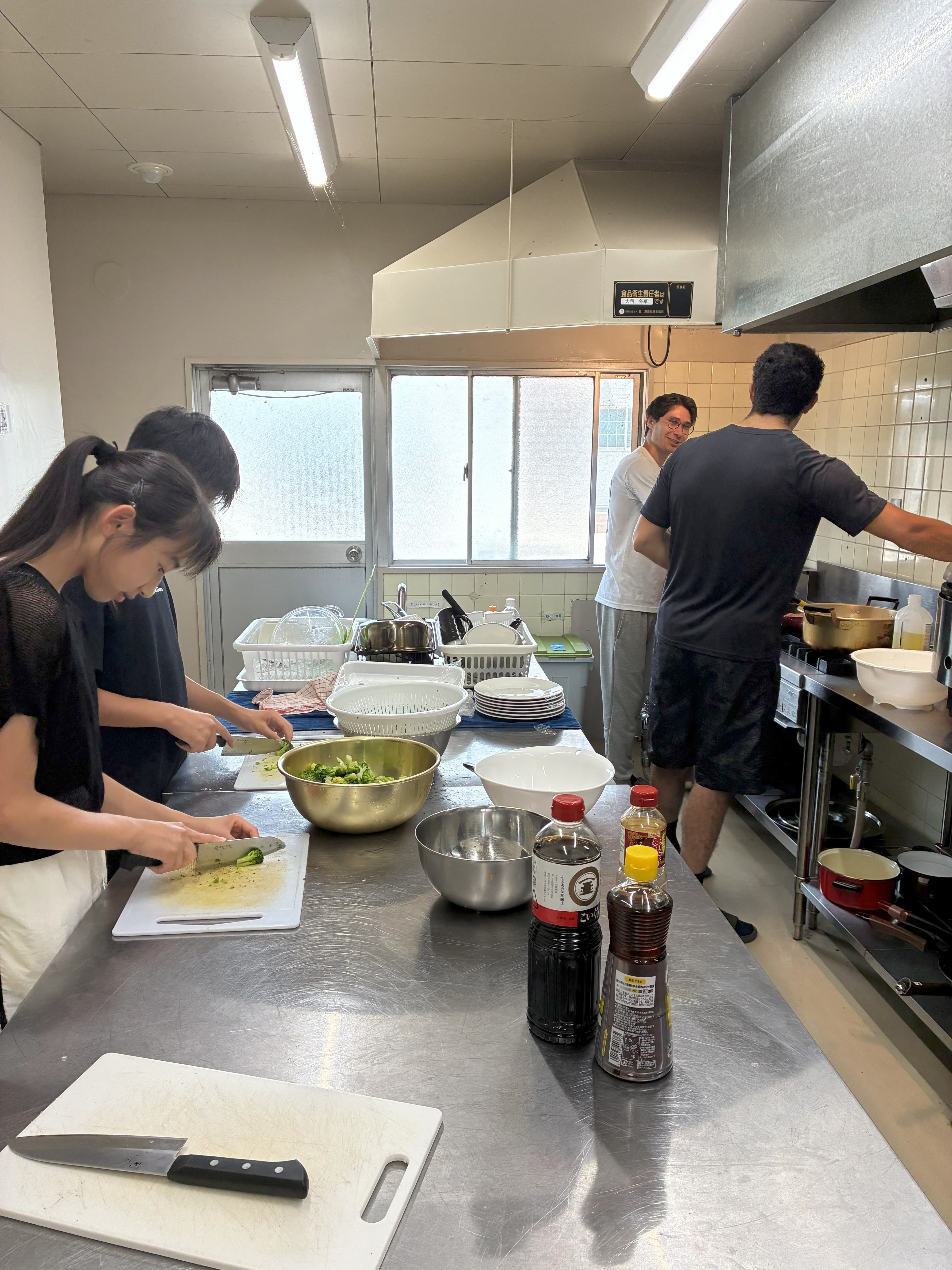 Students cooking a meal together in the campus kitchen