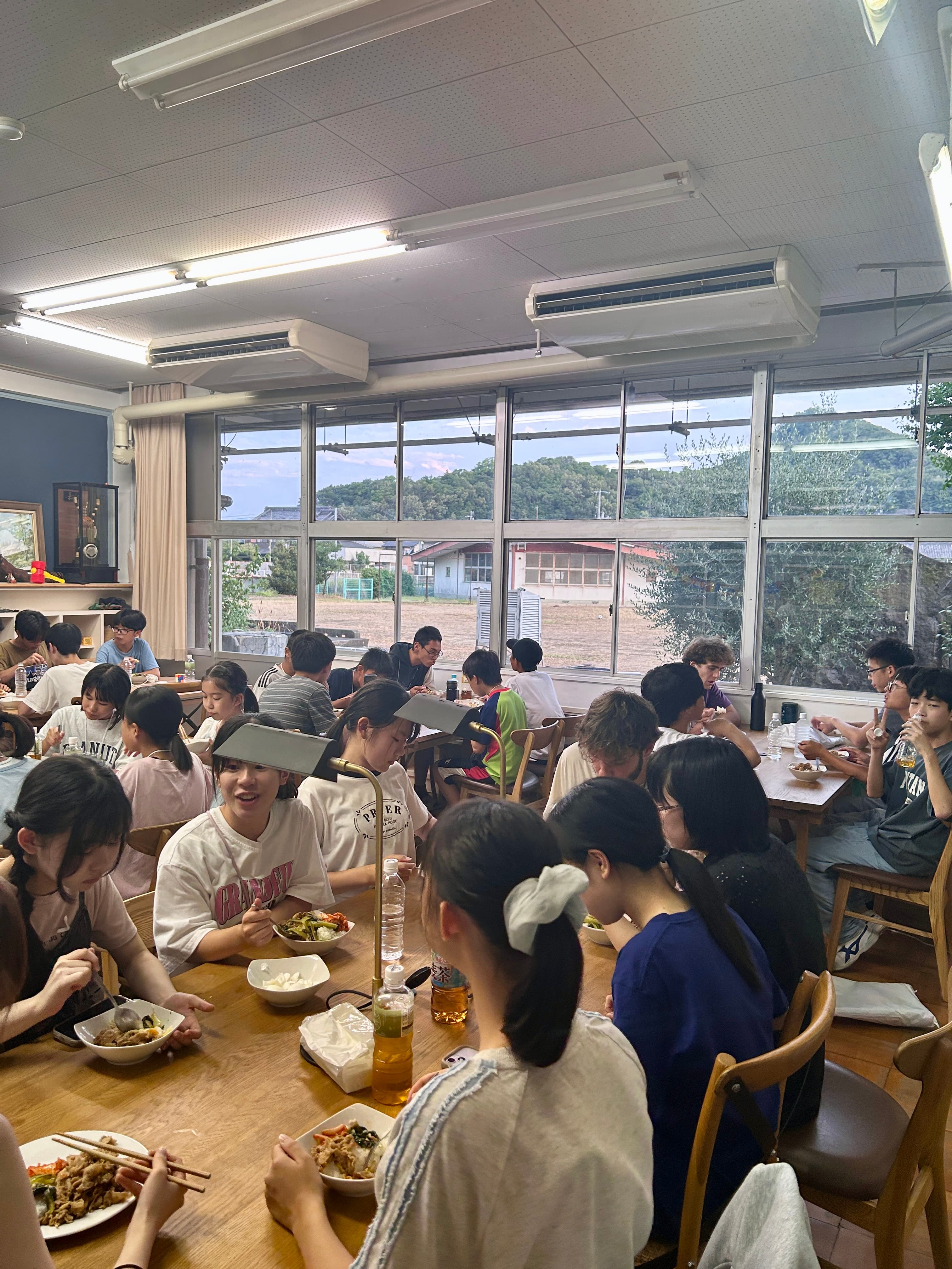 Everyone sharing a meal in the campus dining hall